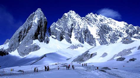 Jade Dragon Snow Mountain, adembenemende panorama's en mystieke mistwouden!